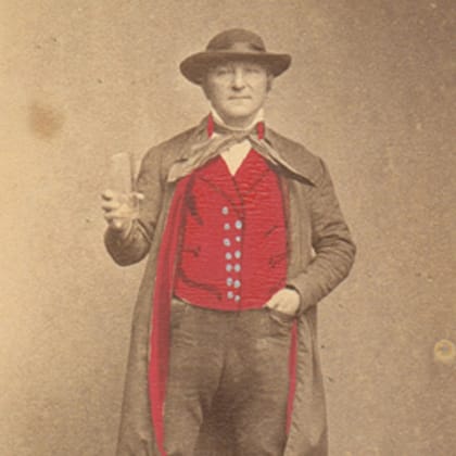 vintage photo of gentleman holding a beer
